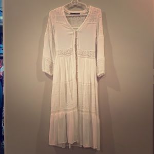 Beautiful white button down dress. Negotiable